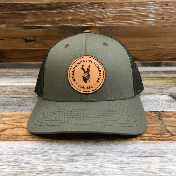 Loden Emblem Leather Patch Trucker Hat • Wyoming Wildlife Federation